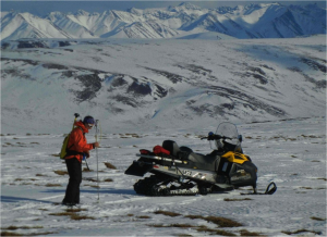 Geophysicist Sveta Stuefer of the University of Alaska-Fairbanks takes one of over 15,000 depth measurements used to validate airborne LiDAR estimates of snow depth near the north-central coast of Alaska. (Credit: Mark Parsons, National Snow and Ice Data Center)