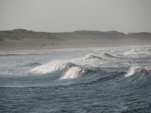 Pollution can be spread faster and further by breaking waves that shot off spinning eddies. (Credit: Glen Bowman/flickr)