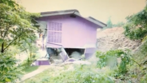 A very interesting video of a house being slowly destroyed by a landslide in Thailand