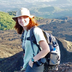 Jessica Ball standing on a cinder cone of Mount Etna in Sicily, Italy (Photo courtesy of Jessica Ball).