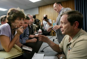 NASA officials talk to members of the press. (Credit: NASA)