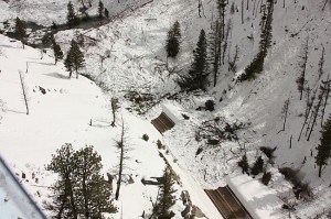 The avalanche buried Highway 21 in piles of snow and debris eight meters (26 feet) high in some places, blocking off the roadway. Credit: Scott Havens