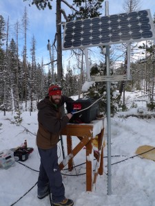 Scott Havens sets up part of an infrasound array to detect avalanches in the mountains surrounding Central Idaho's Highway 21, known as Avalanche Alley. Credit: Scott Havens