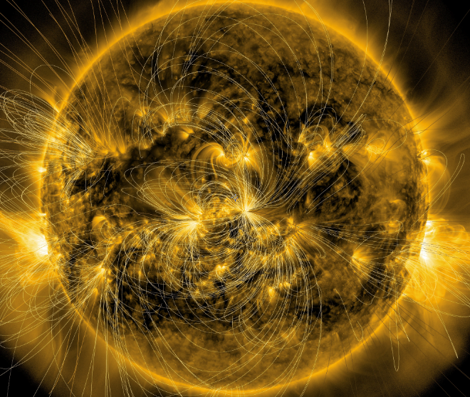 This image of the sun from January 7, 2014, combines a picture of the sun captured by NASA's Solar Dynamics Observatory, or SDO, with a model of the magnetic field lines using data that is also from SDO. A new model based on such data may one day help space weather forecasters better predict how eruptions from the sun will behave at Earth.  Credit: NASA/SDO/LMSAL