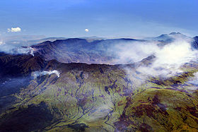 Aerial view of the caldera of Mt Tambora at the island of Sumbawa, Indonesia, which formed during the 1815 eruption of the volcano. A new study shows that extreme natural forces, such as strong volcanic eruptions, were shown to disrupt climate trends for decades.  Credit: Wikimedia Commons