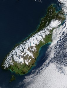This satellite image shows the aftermath of a severe blizzard that hit the South Island of New Zealand in July 2003. Higher regions are draped in snow, clearly delineating the escarpment northwest of the Southern Alps, formed by the 600 km (370 mi) long Alpine Fault. Credit: NASA
