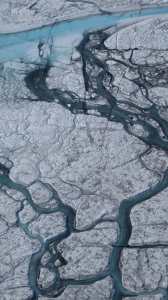 Meltwater creates rivers that flow across the ice sheet. Credit: M. Tedesco/CCNY.