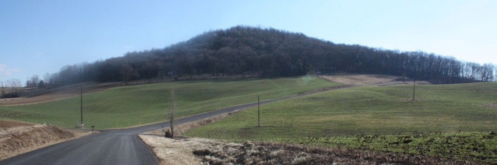 Volcanoes were once active in the southeastern U.S. Mole Hill, pictured here, is a mound of volcanic rock in the Shenandoah Valley in Virginia that formed from an active volcano 48 million years ago (a relatively recent event, in geological time scales). Credit: Jstuby via Wikimedia Commons. 