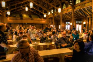 The Federation of Earth Science Information Partners (ESIP) has been building an active community of commoners for nearly two decades. Here they welcome newcomers at their 2015 Summer Meeting. Credit: Bruce Caron. 