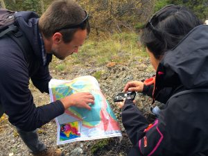 Andreas Beinlich and Masako Tominaga with the geological map our group is using to navigate the Atlin ophiolite. 