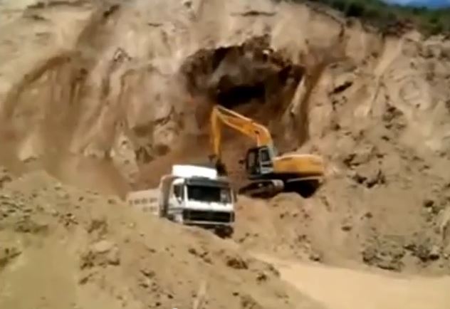 Excavator earth slide from Youtube
