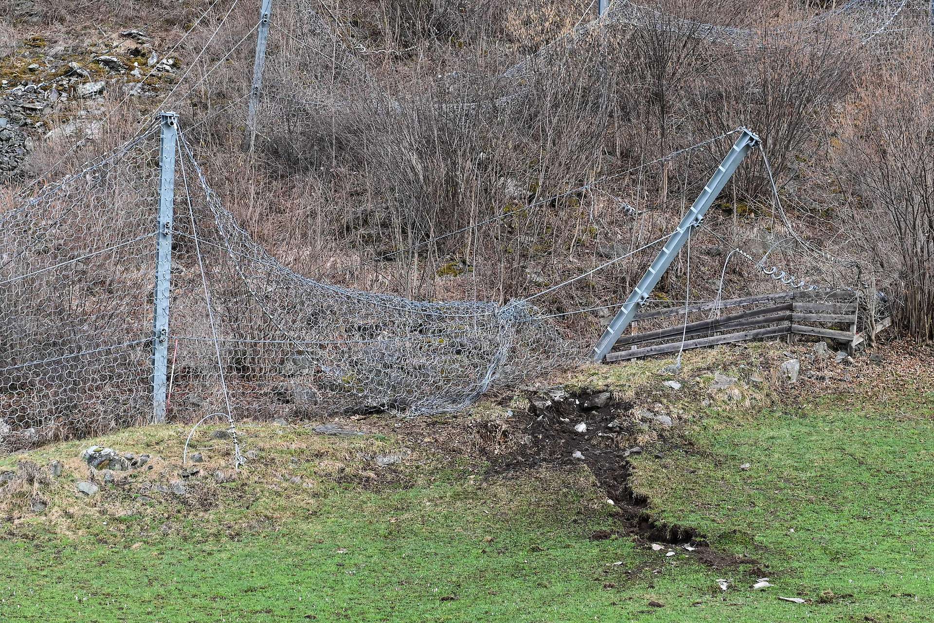 Destroyed flexible barriers along the track of the boulder that struck a house in Neustift in Austria. 