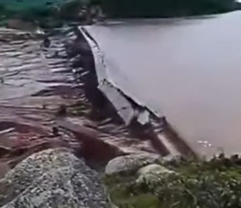 The collapse of the Xinfa Dam in China, as captured
                in a video posted to Youtube.