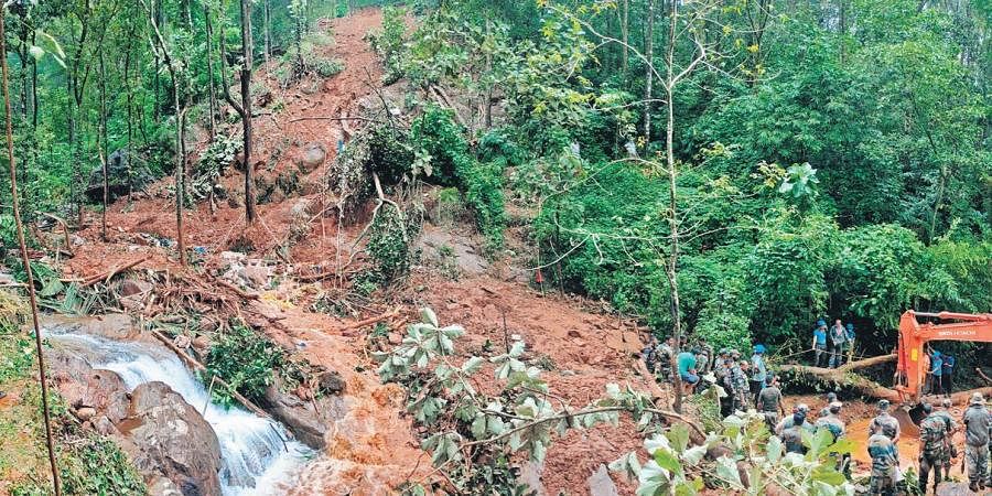 The landslide at Kavali in Koottikkal in Kerala, India, which killed six people. 