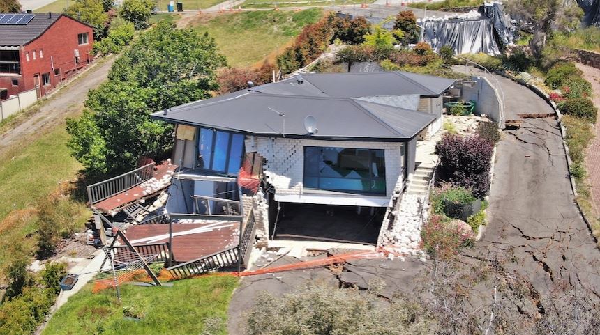 Damage to a house caused by the Mira Mar landslide. 