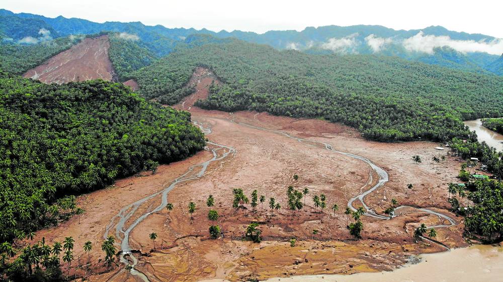 The aftermath of the landslide at Kantagnos village in Baybay City, Leyte, Philippines, triggered by Tropical Storm Megi. 