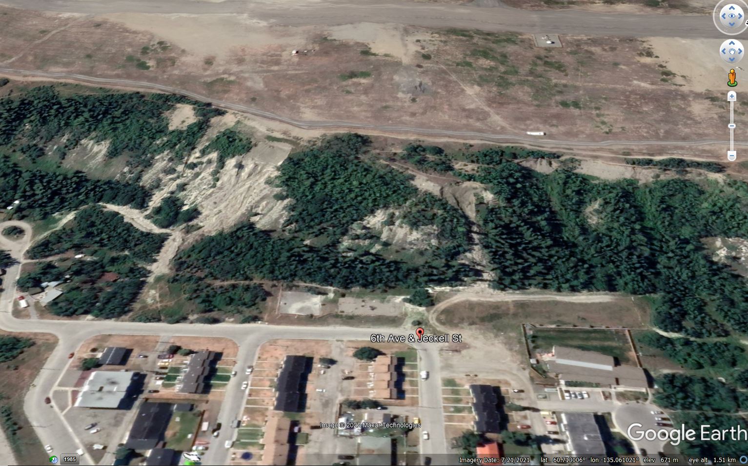 The site of the 28 May 2022landslide on the Whitehorse escarpment in the the Yukon, from Google Earth.