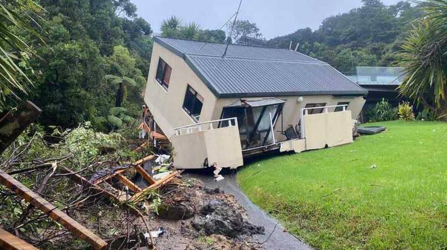 The aftermath of a landslide in Muriwai, Auckland following Cyclone Gabrielle. 