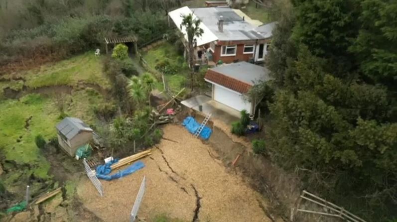 The tension cracks and scarps near to a house in Luccombe on the Isle of Wight. 