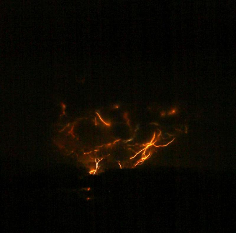Photograph of lightning from Redoubt's 1:20 am March 28 eruption, courtesy of Bretwood Higman (USGS AVO Website)
