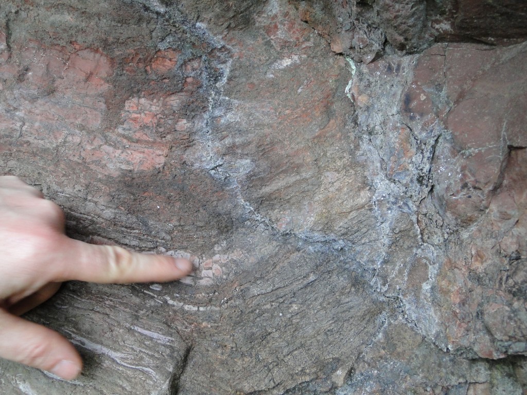 The contact between ___ and the sandstone