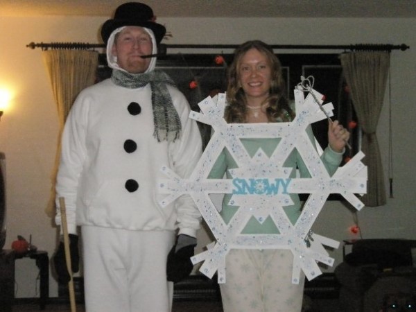 Kathleen Thatcher, a self-titled “Earth Nerd,” is dressed as a stellar dendrite snowflake, complete with snowflake pajamas and snowflake jewelry. “This costume is correct with its six-sided, hexagonal structure. I'm one large stellar dendrite that makes up a big snow storm,” Thatcher said. Her husband, Zack Thatcher, is in the photograph as frosty the snowman with corncob pipe and all. “I thought the two costumes complemented one another quite well. Stellar dendrites make great snowman-making snow,” Kathleen said. Photo courtesy of Kathleen Thatcher.