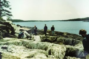 Dr. Stephen G. Pollock (center) with University of Southern Maine Geology Field Camp students at a marble outcrop near Calais, ME, June 1982. 