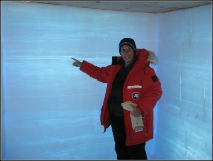 Julie Palais of the NSF in a snow hole at WAIS. You can see the individual layers of snow. The climate for EACH year can be determined from these layers. Image from National Sci. Foundation.