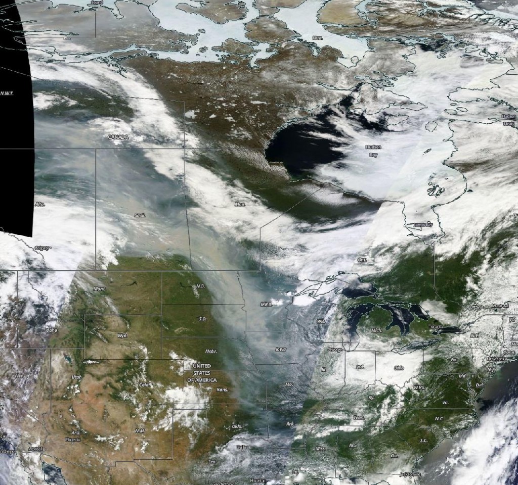 This view from the NASA Terra Satellite shows the dense smoke from the fires in northern Alberta and Saskatchewan now extending into Missouri.