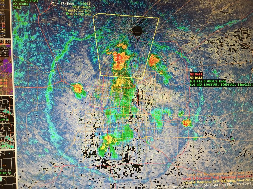 From NWS Memphis. Note the circular outflow boundary of cool air around the microburst.